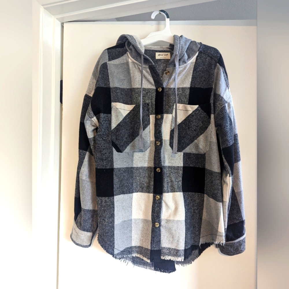 Black and gray flannel hoodie with frayed bottom hem